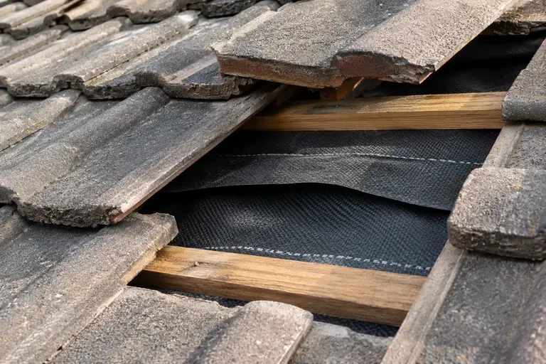 Illustration of roof-underlay work beneath a roof covering